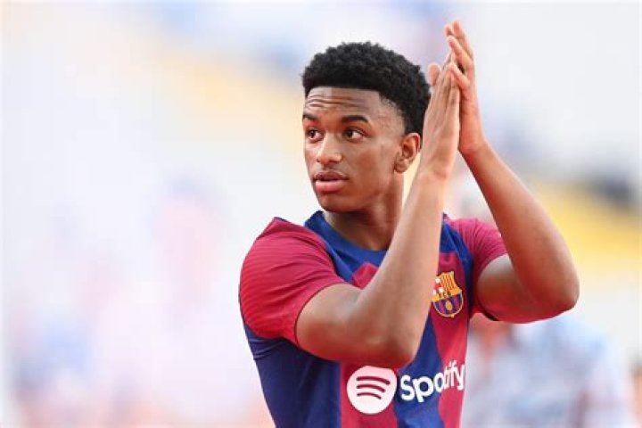 Uncovering The "Bald Barcelona Player" Mystery